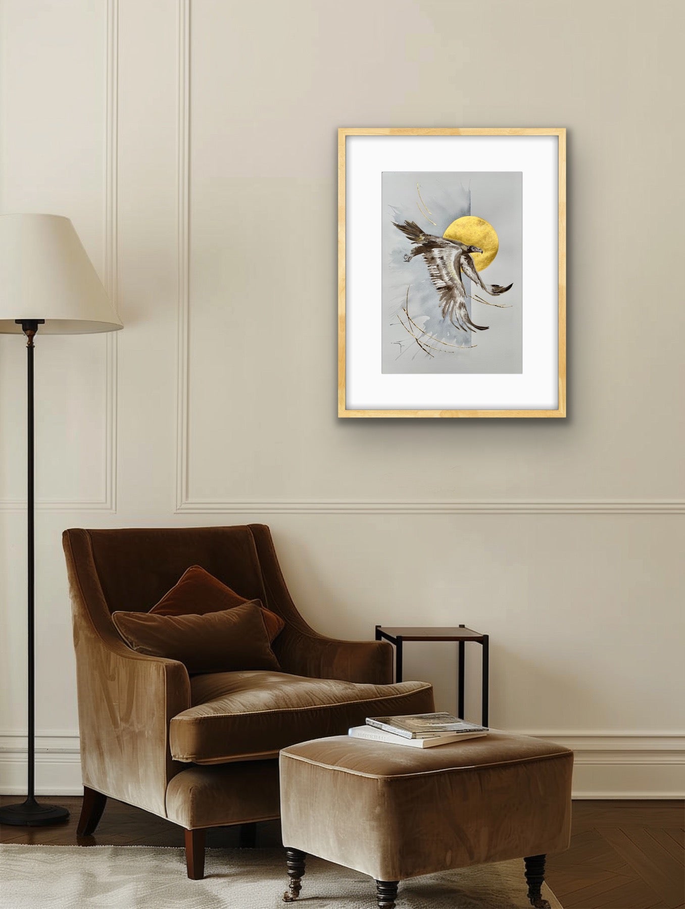'Aloft' Wedge-Tailed Eagle fine art print by Marina Fox, framed in natural timber, displayed above a velvet armchair in a warm neutral living room