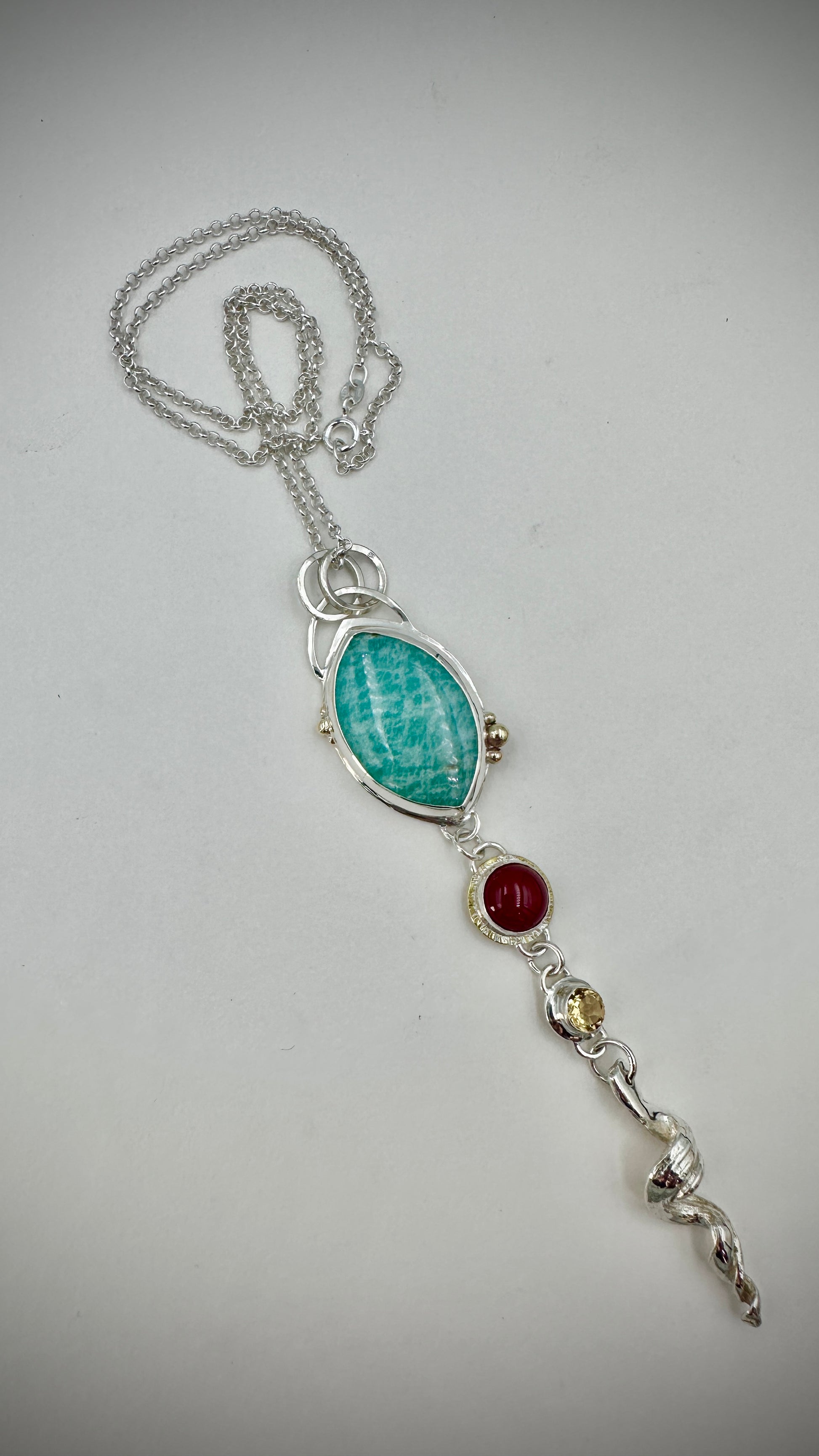 Close-up of handmade Amazonite pendant with organic silver mitsuro hikime twist and gemstone drops – Marina Fox Fine Art