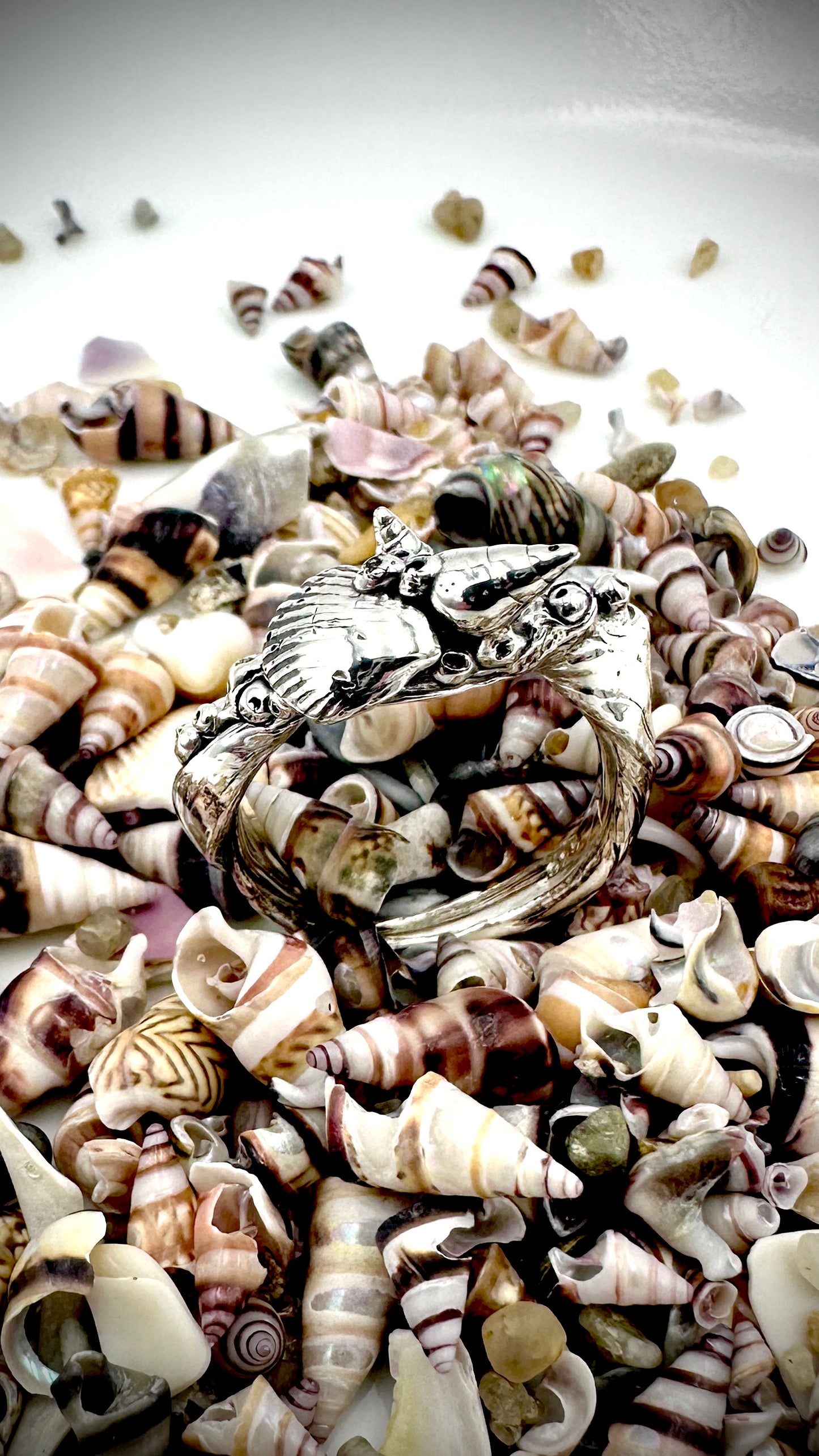 Close-up of sterling silver cast shells on Shelley Beach Ring, handmade using Mitsuro Hikime technique