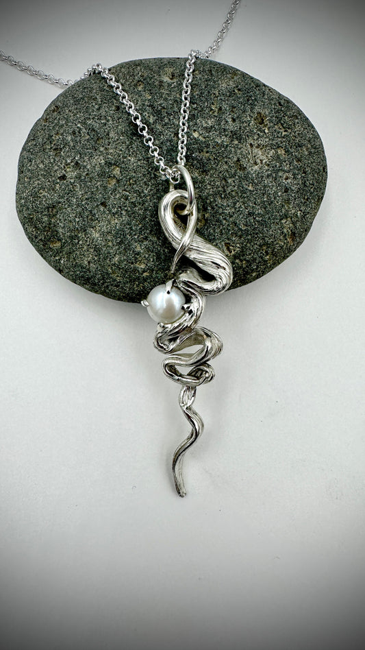 Detail of hand-twisted Mitsuro Hikime silver pendant with 10mm white Freshwater Pearl accent