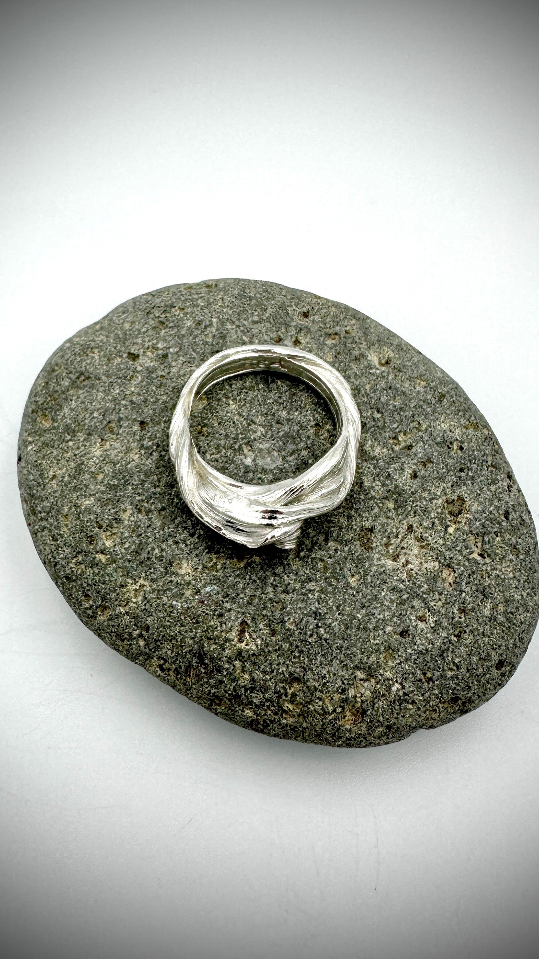 Flow State Sterling Silver Ring flat lay, lost wax cast artisan jewellery by Marina Fox Fine Art